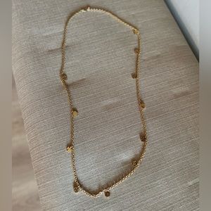 Tory Burch long gold necklace gently used
